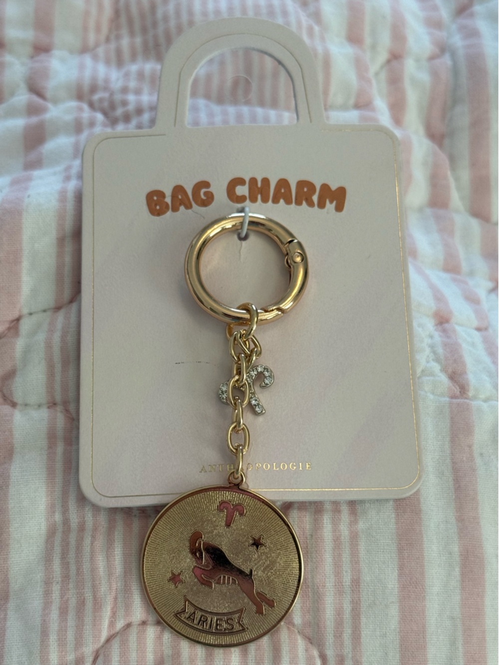 Anthropologie Gold and Pink Aries Zodiac Bag Charm